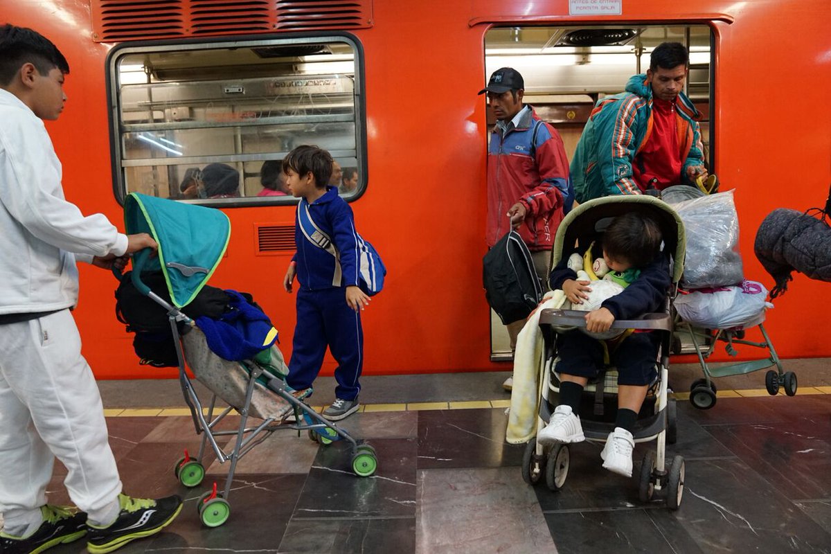 #CaravanaMigrantes Thousands left MexicoCity on Saturday, walking, getting free rides on metro, buses, hitching with trucks, arriving to Queretaro. Next stop: Irapuato. Scoring rides north key to advance to Tijuana, more than 1,500 miles away. Photos: Liliana Nieto del Rio.   