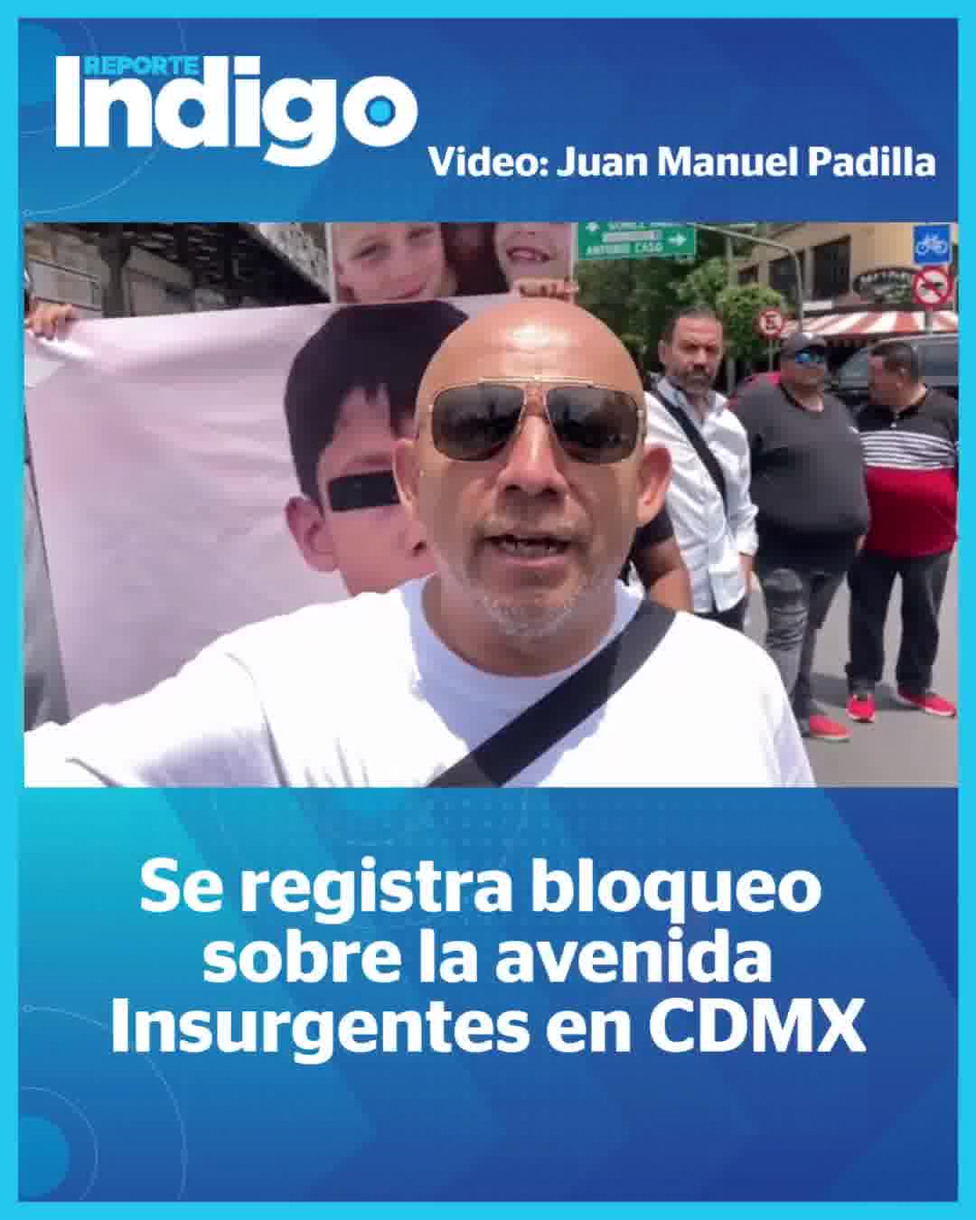 A group of protesters blockade Insurgentes Avenue and Madrid Street. They demand justice in a case of vicarious violence.