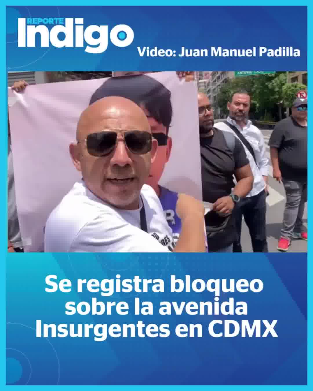 A group of protesters blockade Insurgentes Avenue and Madrid Street. They demand justice in a case of vicarious violence.