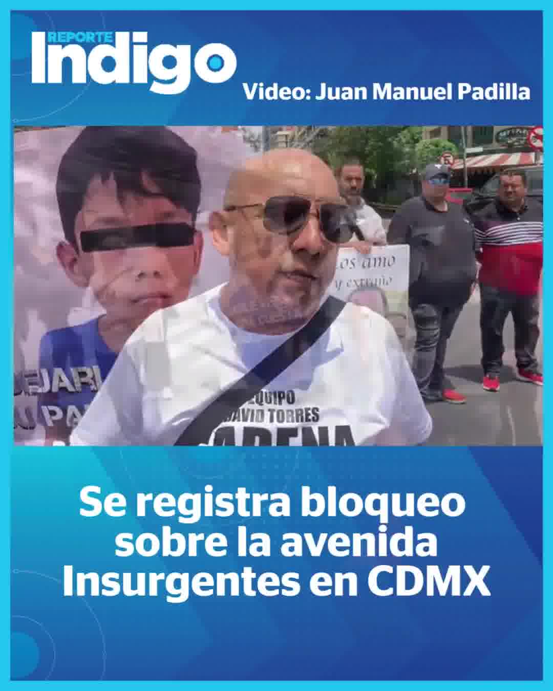A group of protesters blockade Insurgentes Avenue and Madrid Street. They demand justice in a case of vicarious violence.