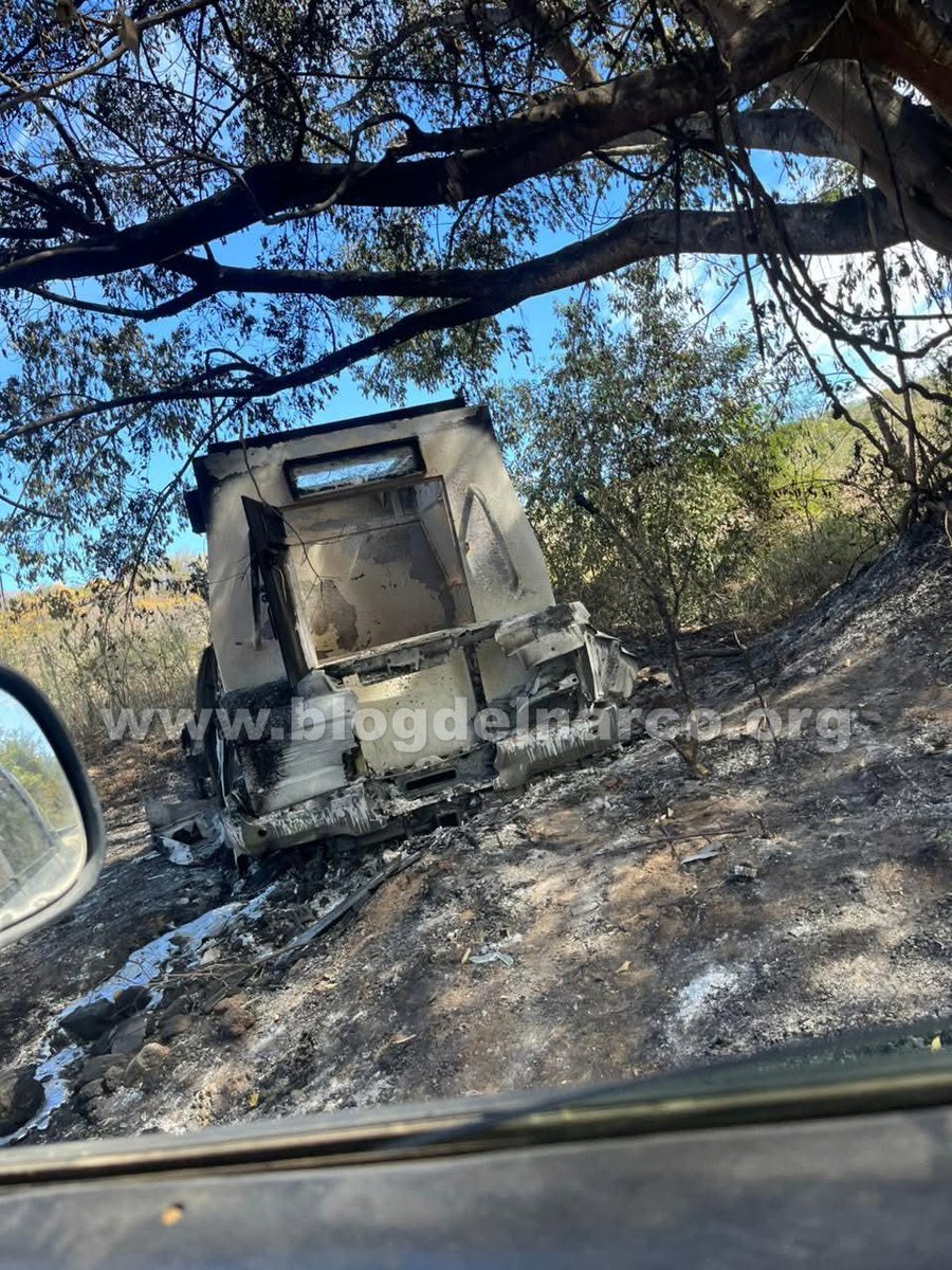 Burned-out trucks were all that remained of the hitmen after they clashed with federal forces in the mountainous region of Mocorito, Sinaloa.